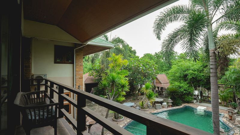 Luxurious mansion with beautiful gardens and a resort-like atmosphere, located on the Chak Kho-Nong Kham road.