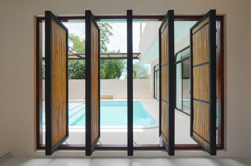 Luxurious minimalist-style pool villa in Sriracha, with private swimming pool, near G Condo.